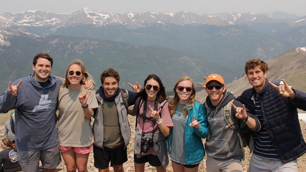 Kids standing on top of a mountain at Frontier Ranch